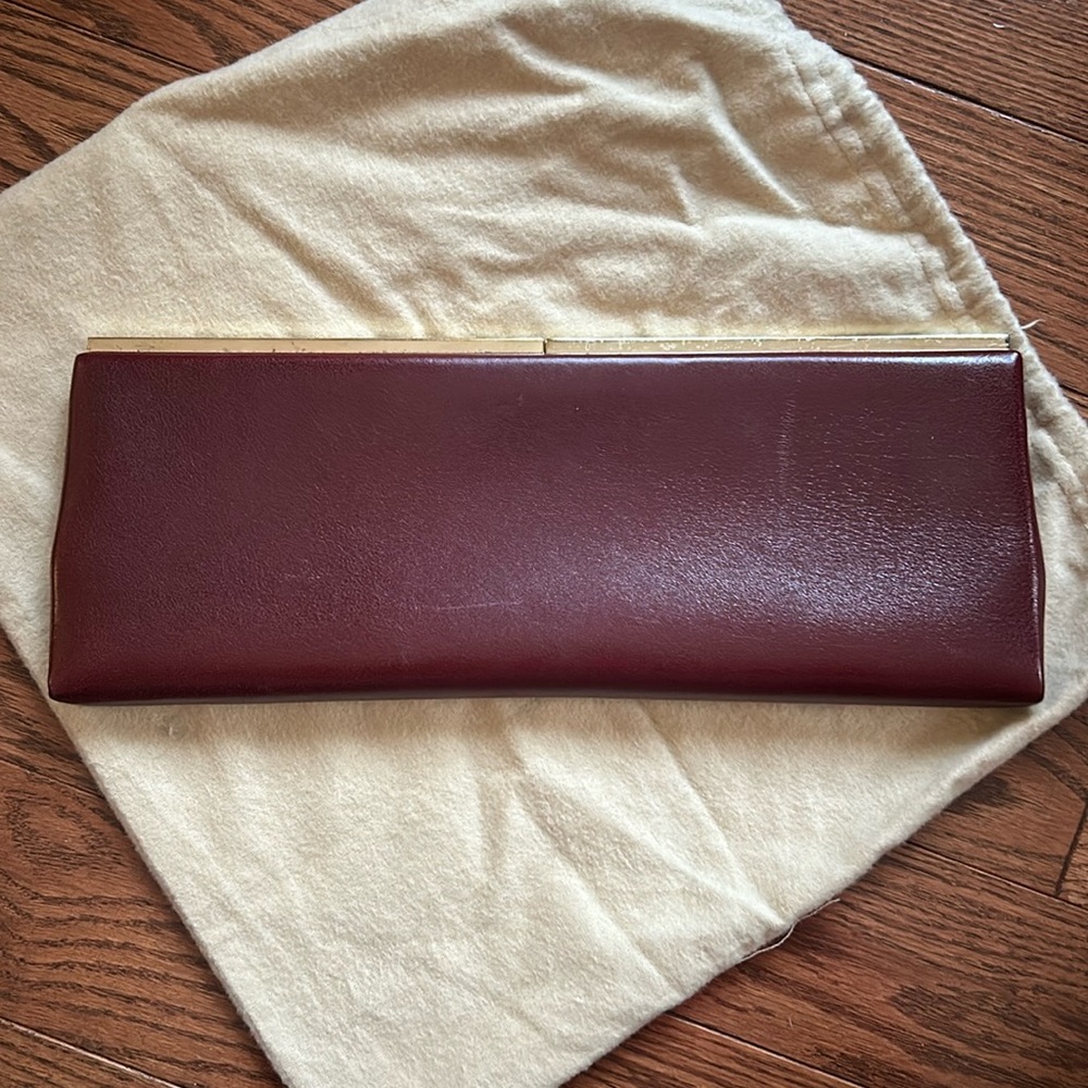 Jimmy Choo deep red clutch with gold hardware